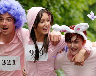 Group of friends running together