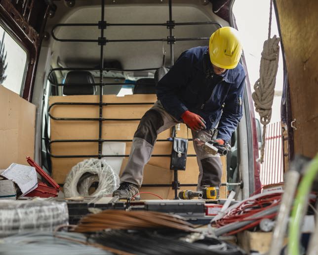 Electrician preparing cables and equipment 