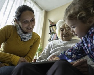 Carer working with a family